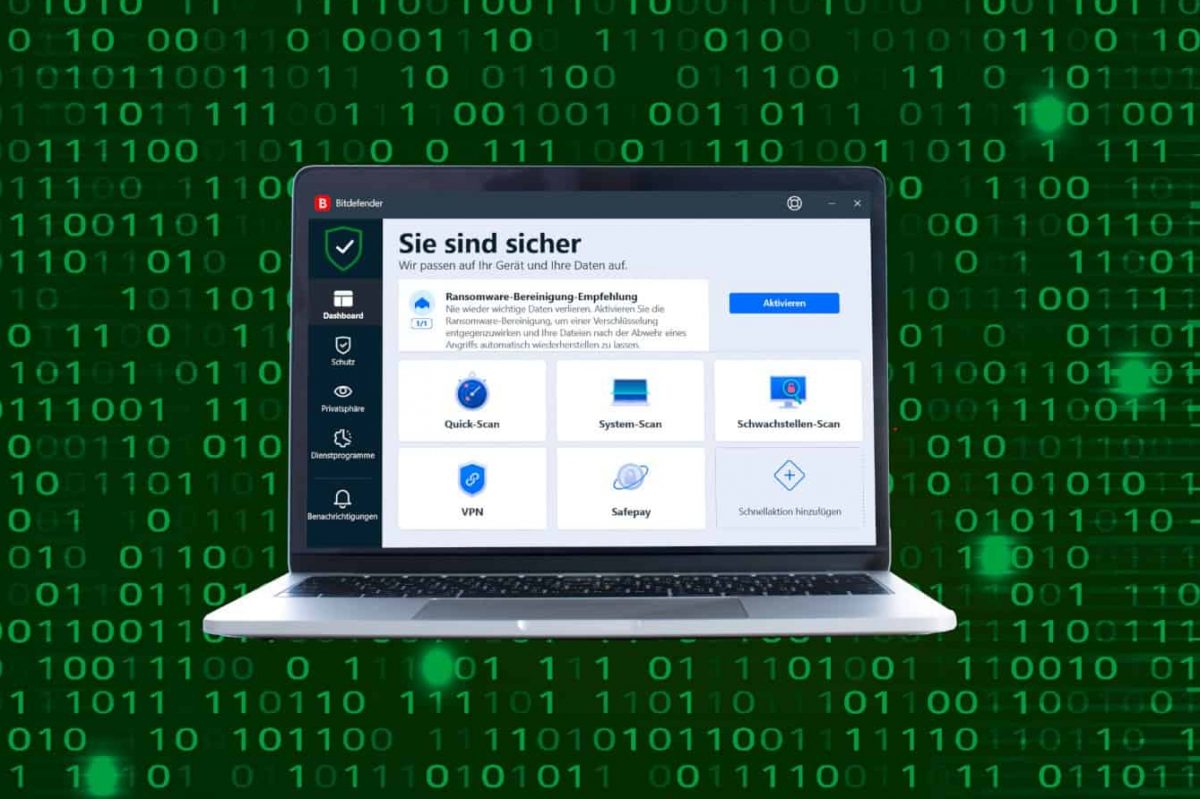 Ein aufgeklapptes Laptop steht auf einem Matrix Hintergrund