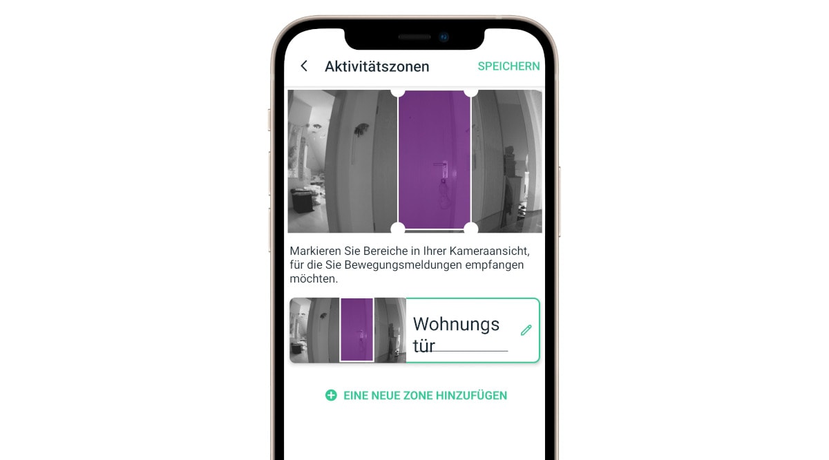 Handy zeigt App zum Einstellen des Bereichs den eine Videokamera überwachen soll auf weißem Hintergrund