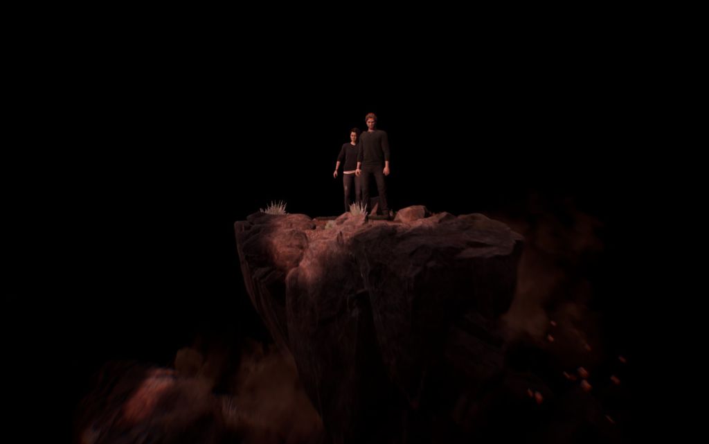 Frau und Mann stehen auf hohem Felsen und schauen hinab vor schwarzem Hintergrund