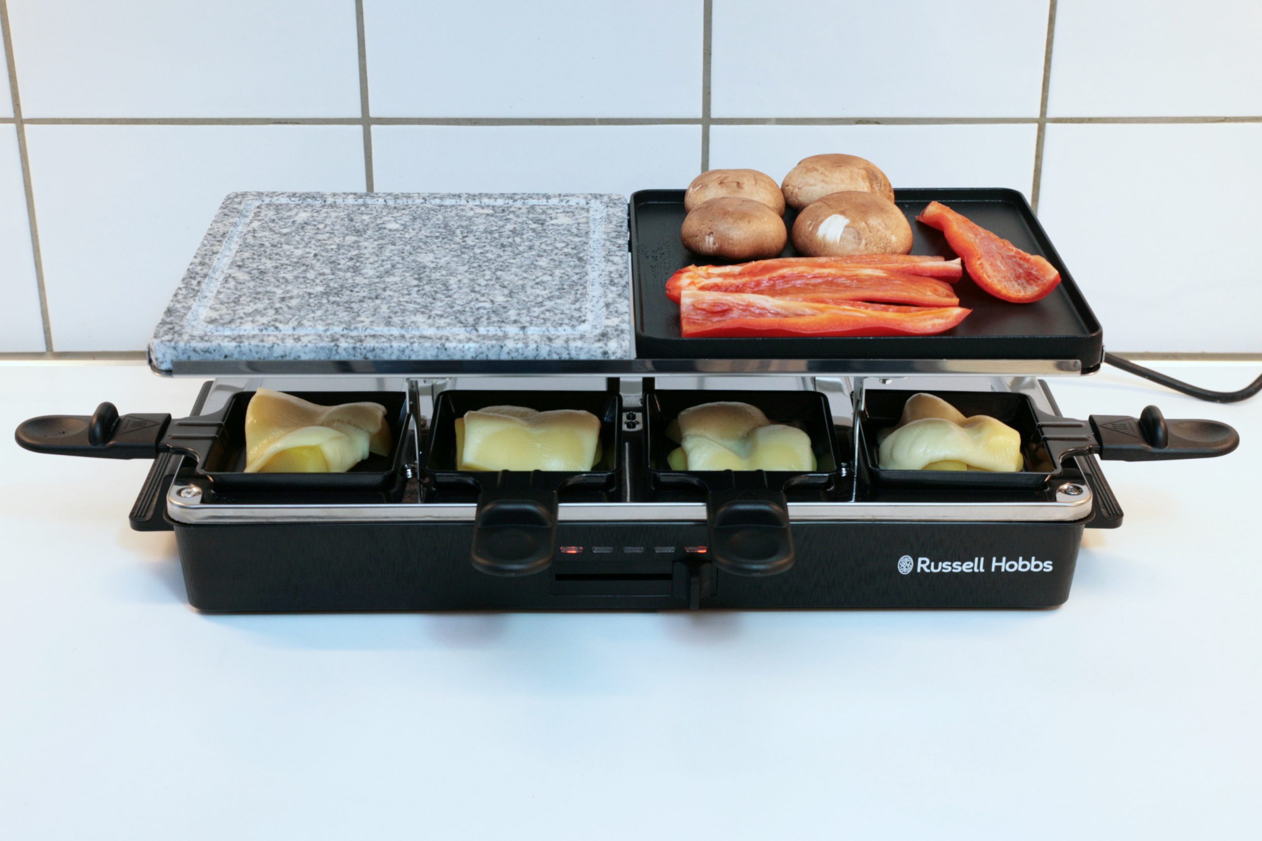 Raclette Grill komplett von vorne befüllt