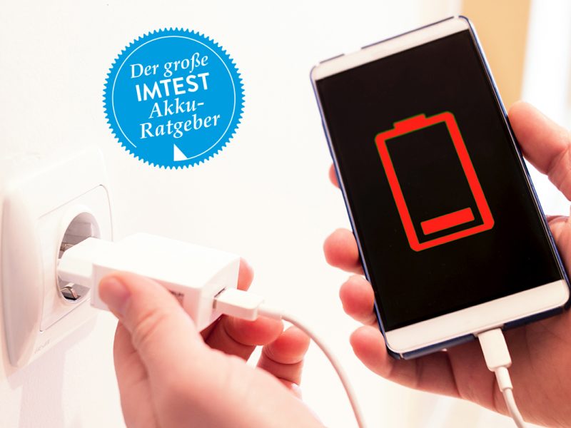 Empty smartphone is charging from the socket
