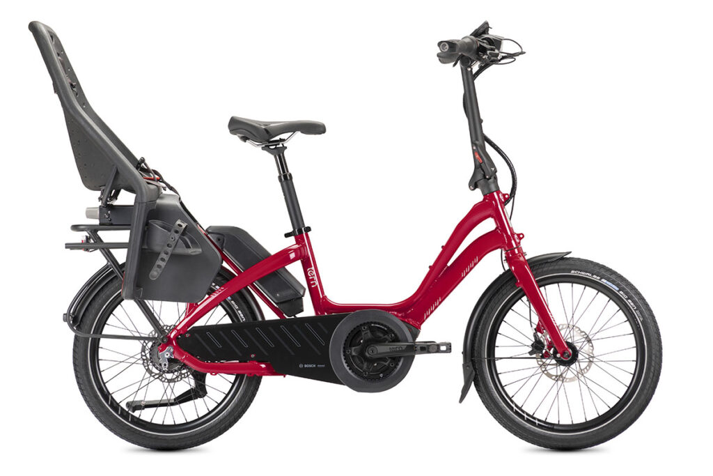 Tern NBD E-Bike vor weißem Hintergrund mit montiertem Kindersitz