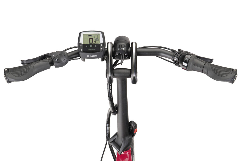 Detailansicht E-Bike-Lenker mit Frontleuchte und Bedindisplay.