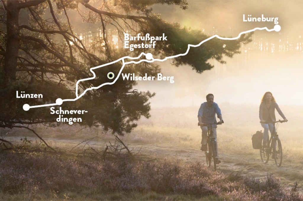 Naturlandschaft Lüneburger Heide mit zwei Radfahrern, Streckengrafik