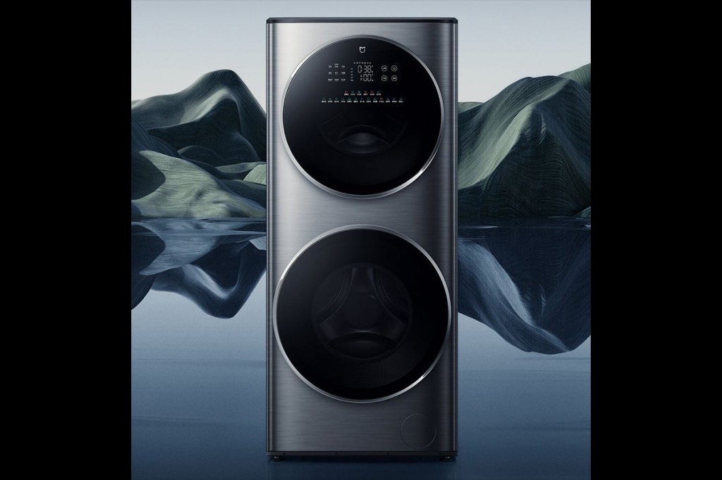 Der neue Doppeltrommel-Waschtrockner von Xiaomi ist vor einer stilisierten Naturlandschaft zu sehen.