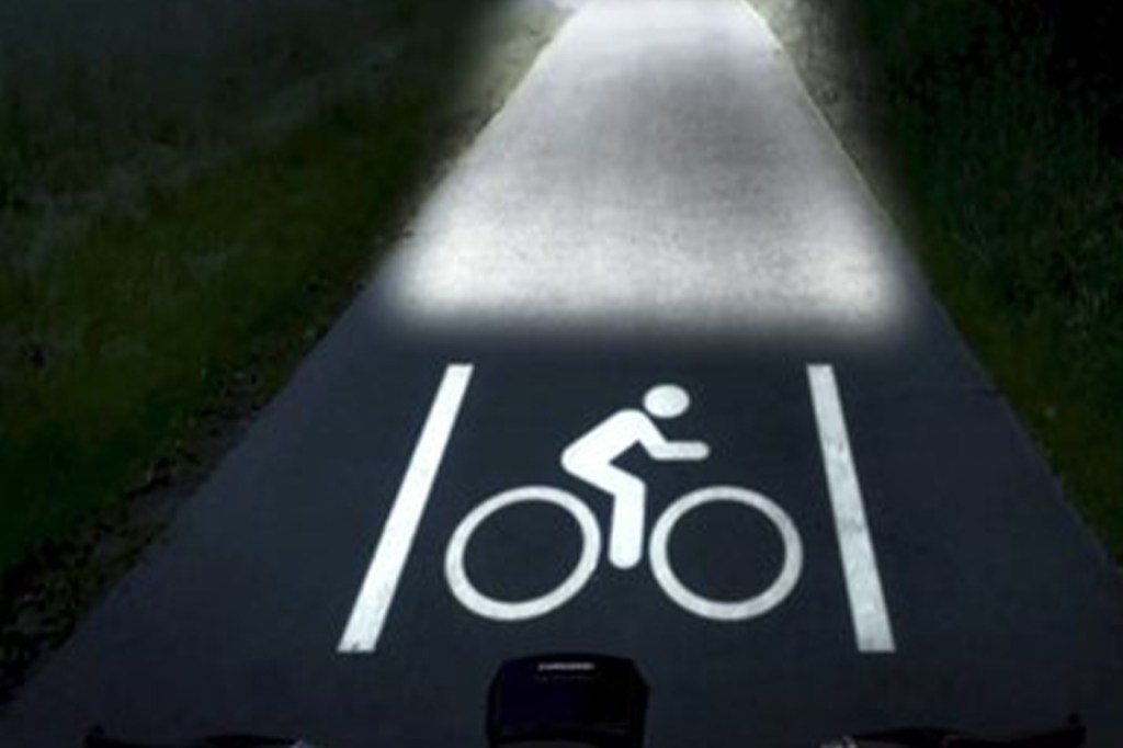 Trelock-Beleuchtung projiziert Icon von Fahrradfahrer auf die Straße