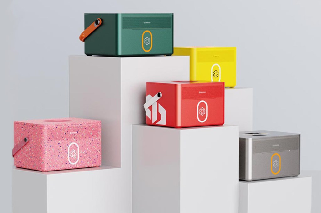 Five Immotor Bays in different colors and patterns are displayed on pedestals.