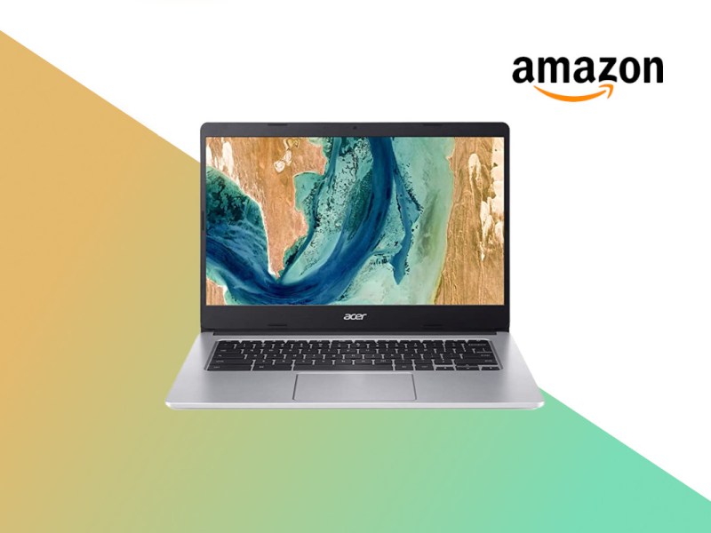 Silbernes Acer-Chromebook aufgeklappt von vorne mit türkis beigen Bild auf orange grünem Hintergrund mit weißem Bereich oben, Amazon Logo oben rechts