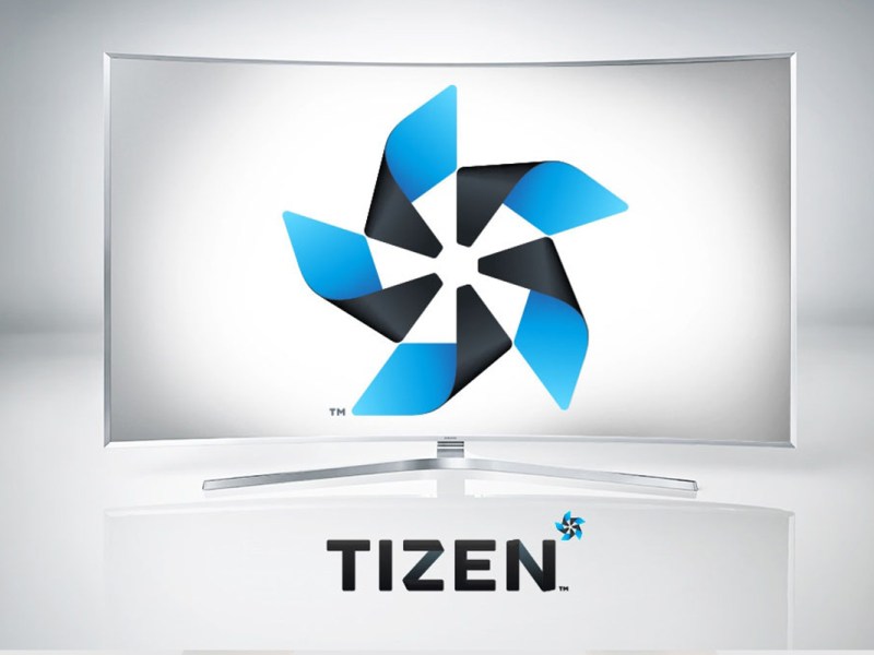 Das Samsung-Tizen-Logo vor einem silbernen Hintergrund.