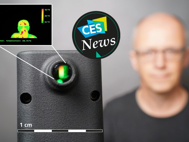 Ein Mann wird per Wärmebildkamera auf Fieber gescannt.