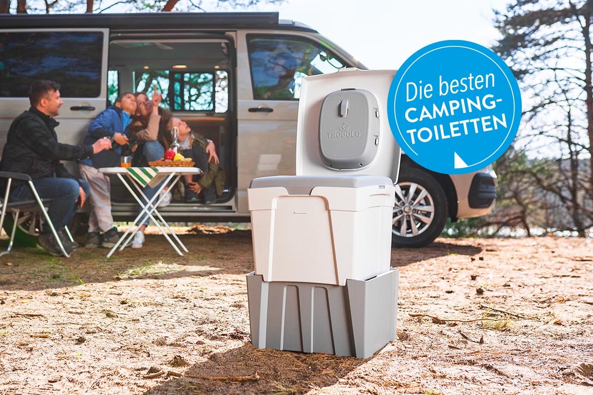 Campingtoilette Trobolo vor einem Van in der Natur