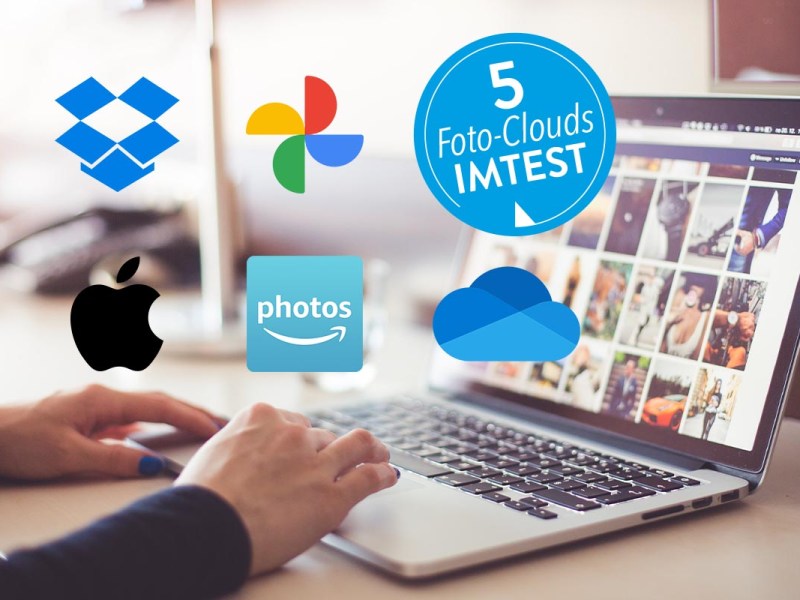 Logos von Foto-Clouds vor einem Laptop, der auf dem Tisch steht