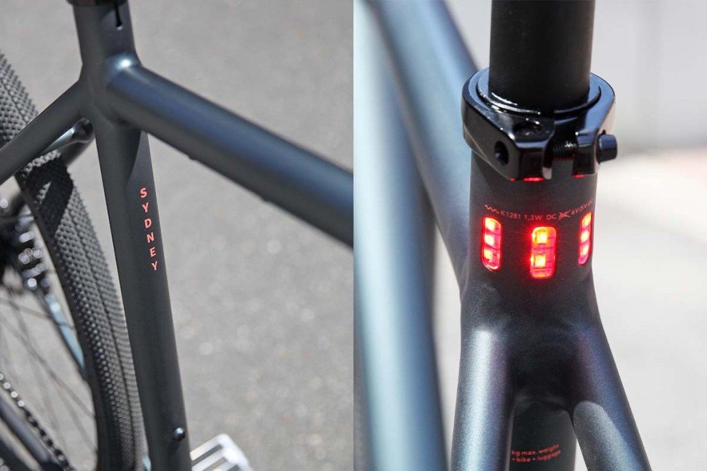 Closeaufnahme E-bike Sydney von coboc - links der Rahmen mit Reifen, rechts das im Rahmen integrierte Rücklicht
