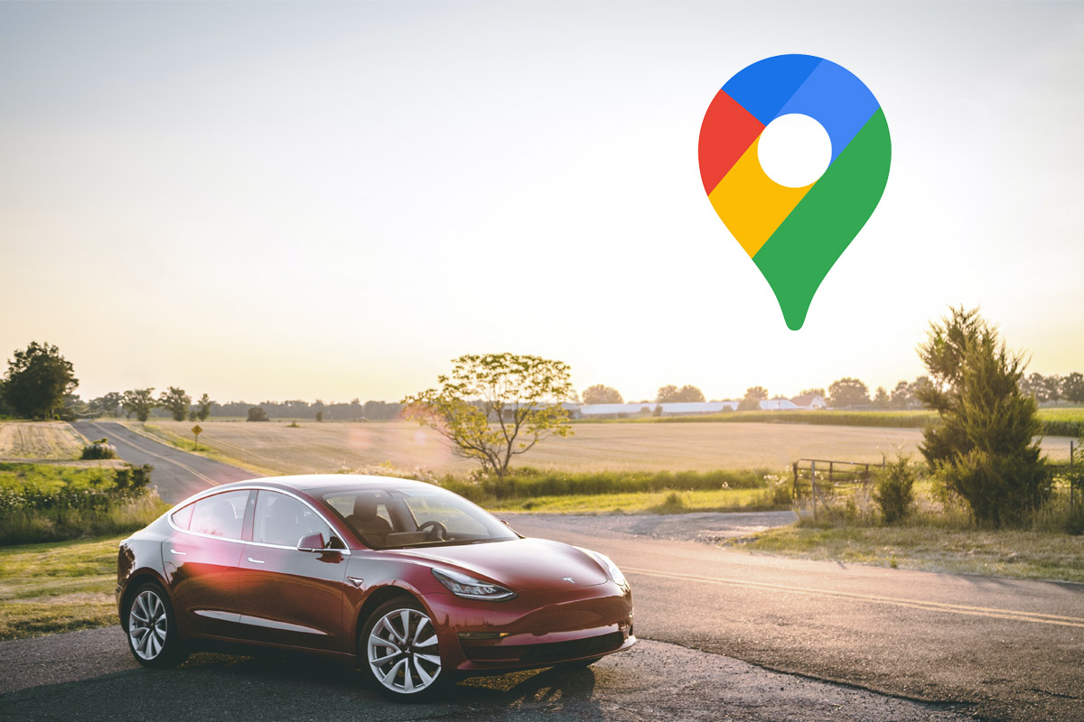 Ein Tesla hält an einer Landstraße.