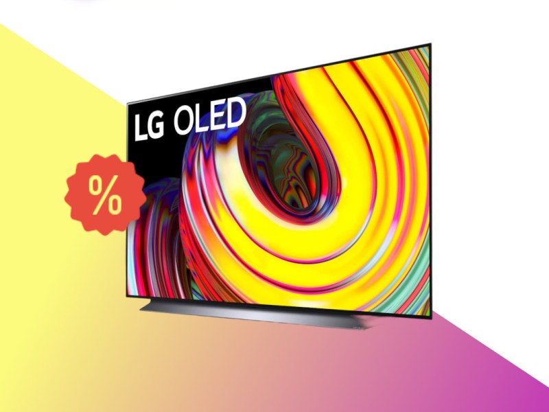 LG-OLED-TV schräg von vorne mit buntem Wirbel auf weißem Hintergrund mit gelb pinkem Farbverlauf unten und rotem Prozentzeichen links mittig