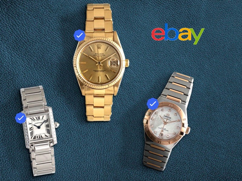 Drei Luxusuhren vor blauem Hintergrund mit dem Schriftzug "ebay"