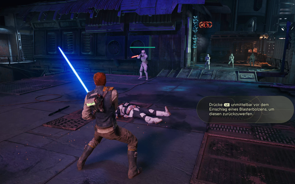 Cal pariert it seinem Blauen Lichtschwert einen Blasterschuss zurück zu einem Stormtrooper. Es ist Nacht, im Hintergrund weitere Stormtrooper.