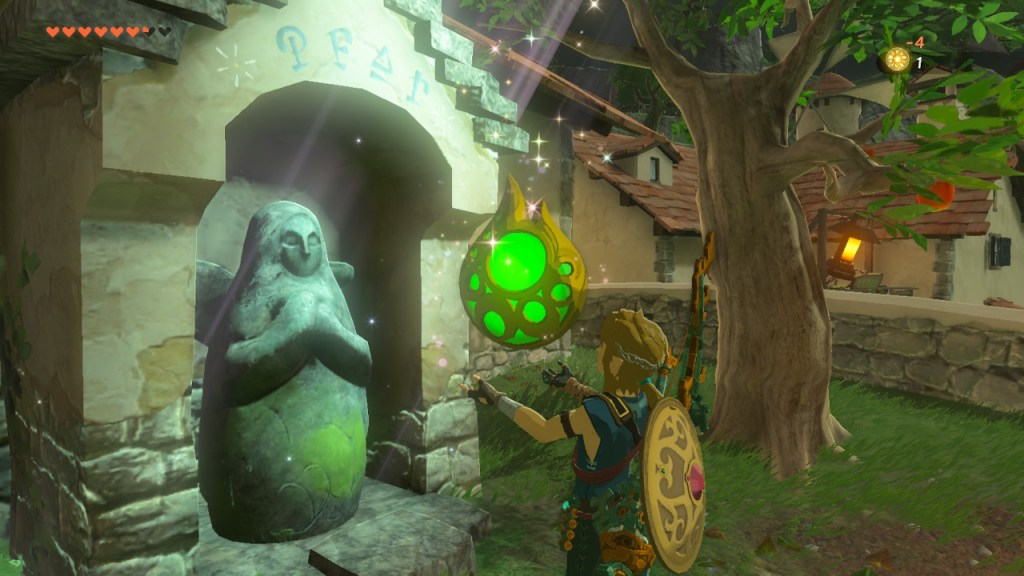 Screenshot aus dem Spiel Zelda: Tears of the Kingdom. Held Link betet vor einer Götterstatue.