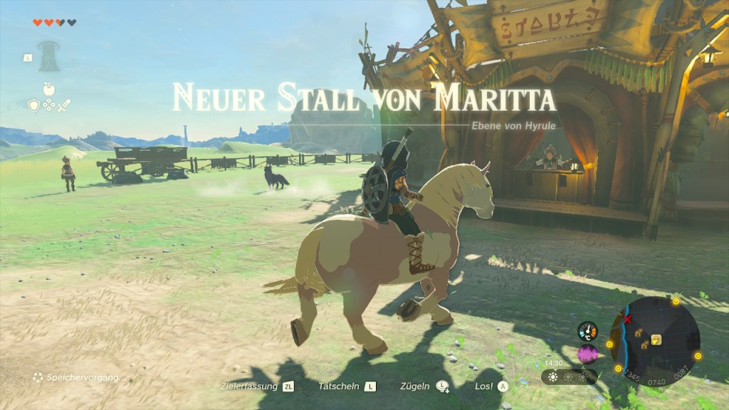 Screenshot aus dem Spiel Zelda: Tears of the Kingdom. Held Link reitet auf einem Pferd zum Stall.