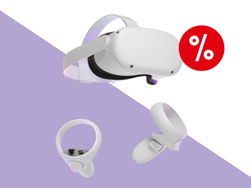 Weiße Meta Quest 2 VR-Brille schräg von vorne mit zwei kleineren Handteilen darunter auf helllila weißem Hintergrund mit rotem Prozentbutton oben rechts