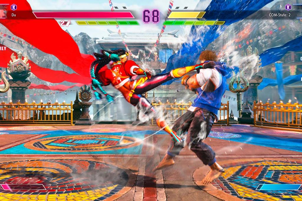Ein Bild aus dem Videospiel Street Fighter 6. Kimberly tritt gegen Luke an.