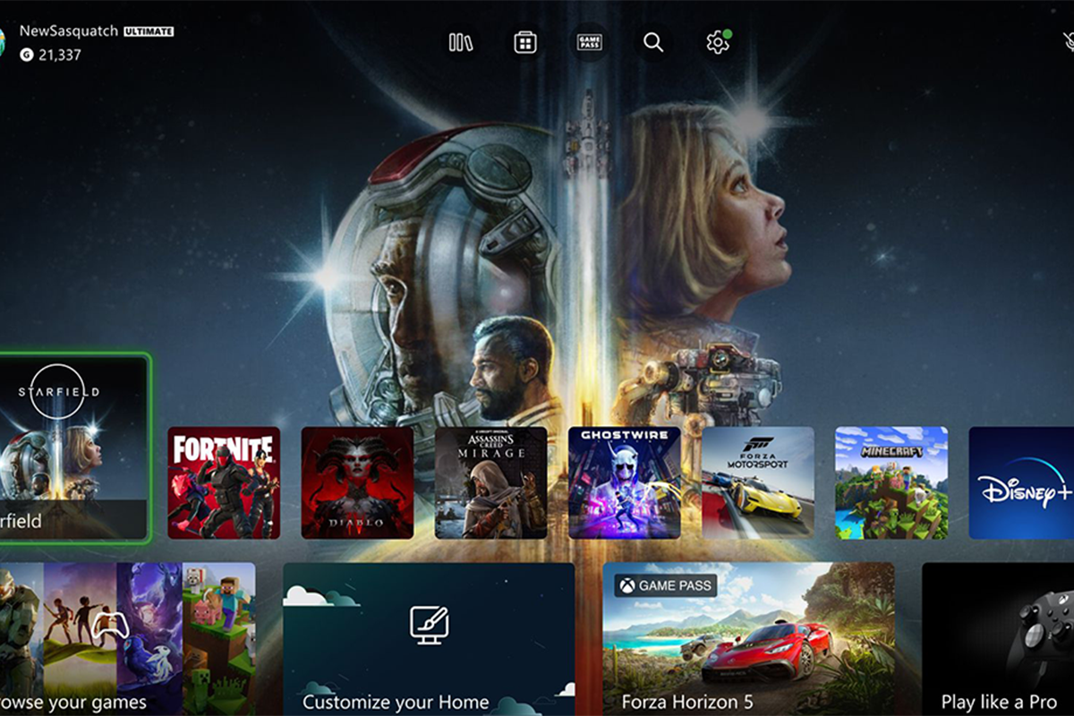 Das neue Xbox-Hauptmenü mit einem Starfield-Hintergrund.
