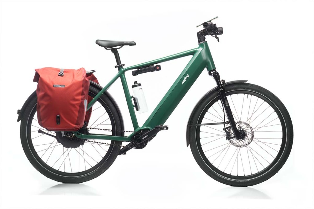 Productshot grünes E-Bike von Möve mit Gepäcktaschen