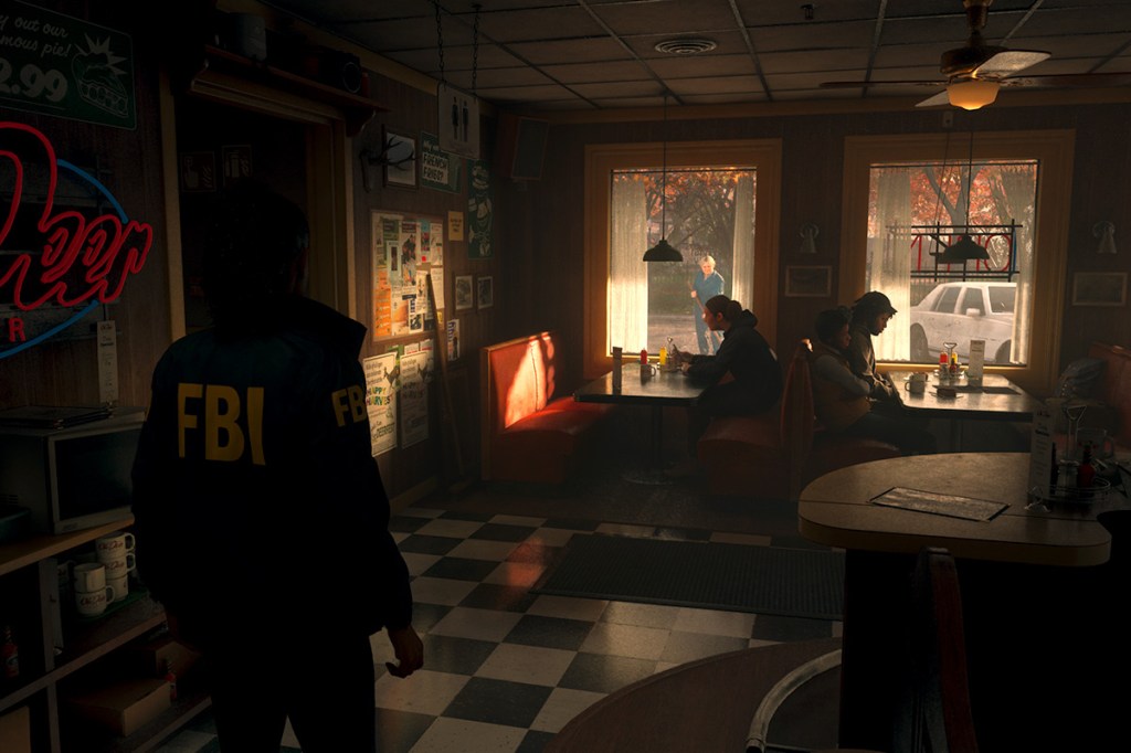 Ein Screenshot aus dem Videospiel Alan Wake 2. Man sieht ein amerikanisches Diner.