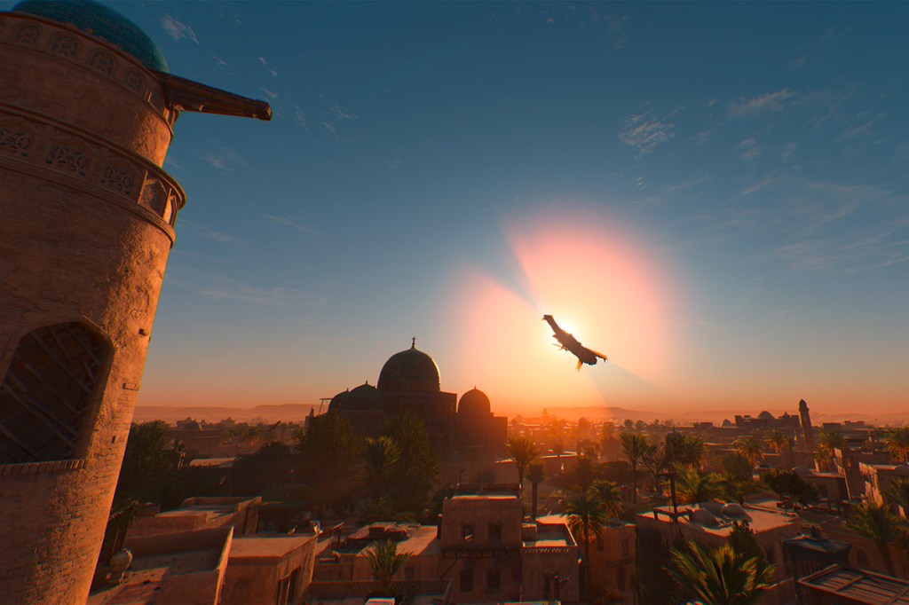 Ein Screenshot aus dem Spiel Assassin's Creed Mirage, zu sehen ist der Fotomodus, wo ein Sprung im Sonnenuntergang dramatisch in Szene gesetzt wird.