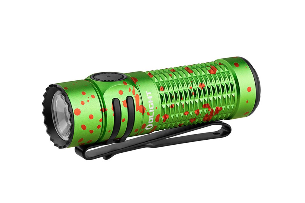 Grüne Olight Taschenlampe mit roten Punkten
