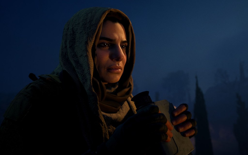 Eine Frau mit Kopftuch, in der Nacht. Screenshot aus Modern Warfare 3.