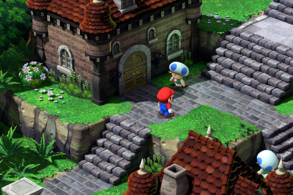 Screenshot aus dem Videospiel Super Mario RPG. Man sieht ein hübsches Dort mit Steinhäuschen.