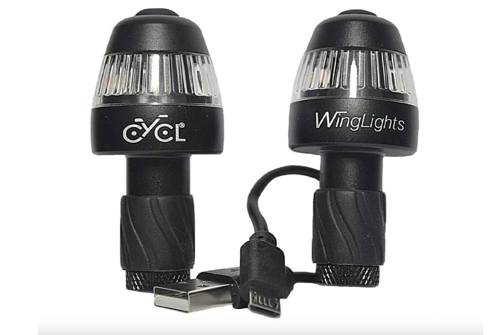 Productshot von zwei Blinklichtern, die man im Lenkerende eines Fahrrdads platzieren kann