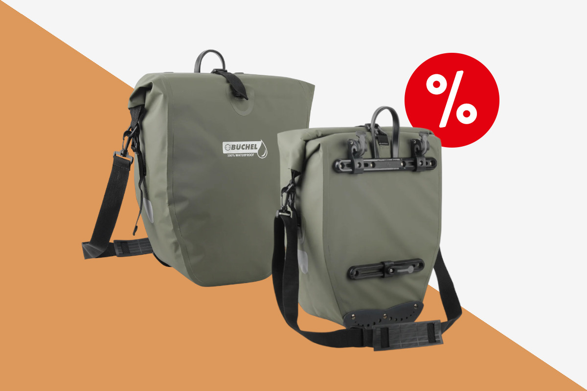 Fahrradtasche von Büchel in Olive schwarz von vorne und hinten mit Schultergurt auf orangenem Hintergrund mit rotem Prozentbutton oben rechts