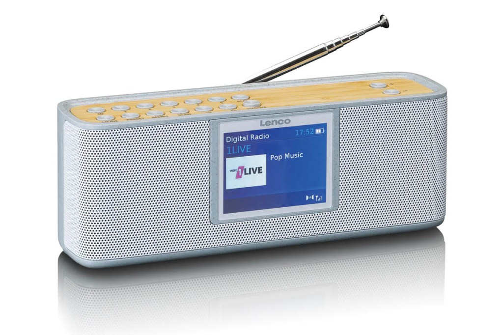 Ein modernes, graues Digitalradio mit Holzoptik am Deckel
