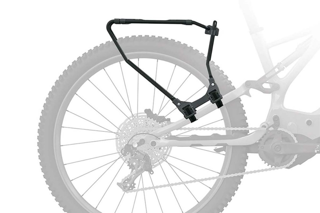 Produktshot eines Fahrradgepäckträgers, man sieht ein HInterrad als Grafik ausgegraut im Hintergrund