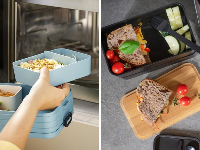 Befüllte Brotdosen verschiedener Hersteller in der Hand gehalten und auf einem Tisch.