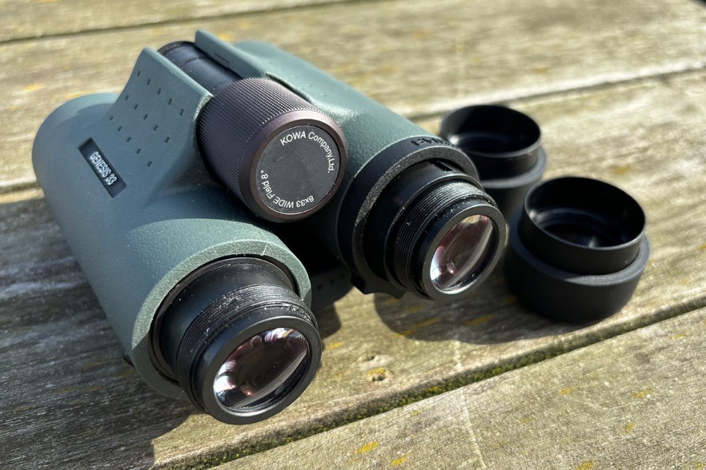 Kowa Genesis Prominar 8x33 binoculars, with eyecups.