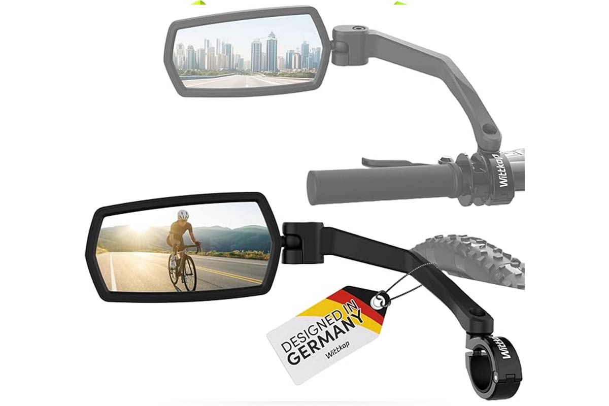 zwei Fahrradspiegel auf weißem Grund, im Spiegel sieht man jeweils ein Bild