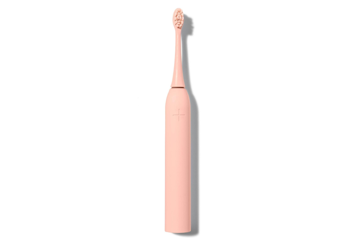 Die WonderBrush Pro von Wondersmile in rosa auf weißem Hintergrund.