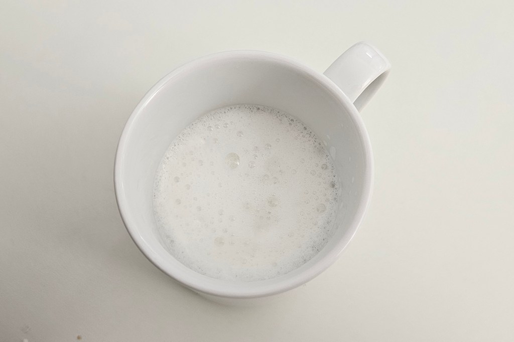Milchschaum in einer Tasse